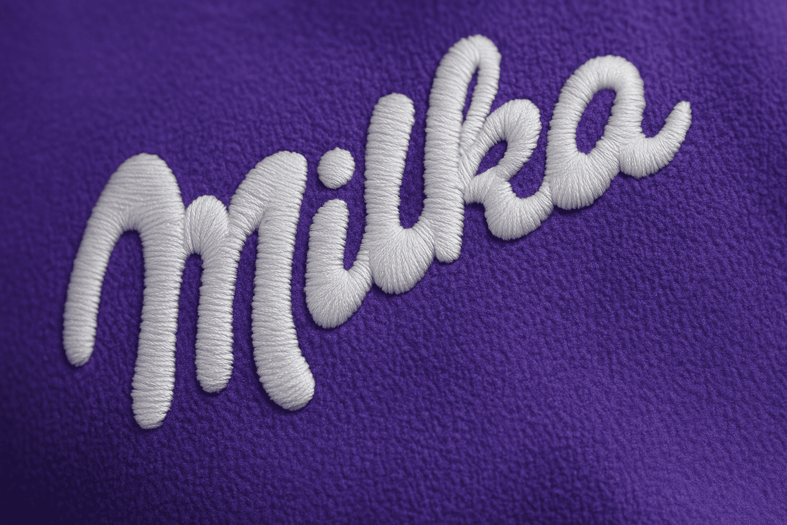 Výšivka loga Milka